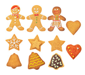 assortment of classic homemade gingerbread cookies decorated with white icing in various christmas holiday shapes, isolated on black.