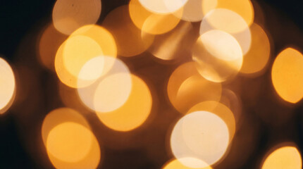 Fototapeta premium Christmas lights with a golden bokeh effect
