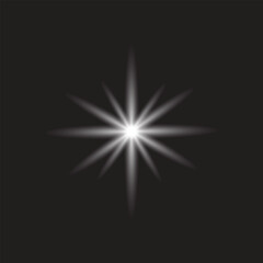 White Glowing Star Light Burst on Dark Background