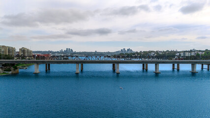 Obraz premium Aerial Panorama Drone view of Parramatta River Sydney Harbour between Balmain Gladesville Birkin Head Point and Roselle on the Bay Run Sydney NSW Australia