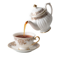 teapot pouring tea into cup on white background