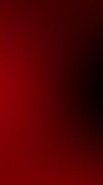 Atmospheric abstract background featuring a smooth and elegant gradient blend of deep crimson red and solid black for a sophisticated design