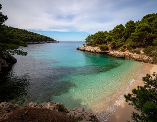 Fototapeta premium Secluded Paradise Cove with Crystal Clear Turquoise Water and Sandy Beach.