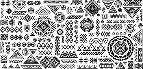 Fototapeta na wymiar Set of primitive ethnic elements isolated on white background. Vector hand drawn geometric patterns in ethnic style.