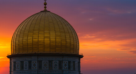 Golden dome shines vibrantly against a stunning fiery sunset sky reflecting warm evening light beautifully. AI Generated