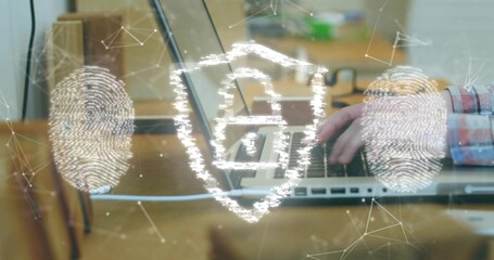 Typing hands in plaid shirt on laptop keys at home office, with shield padlock fingerprint overlays