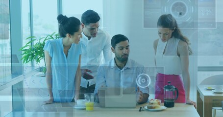 Reviewing four coworkers in business attire consulting laptop at modern office, with HUD overlays
