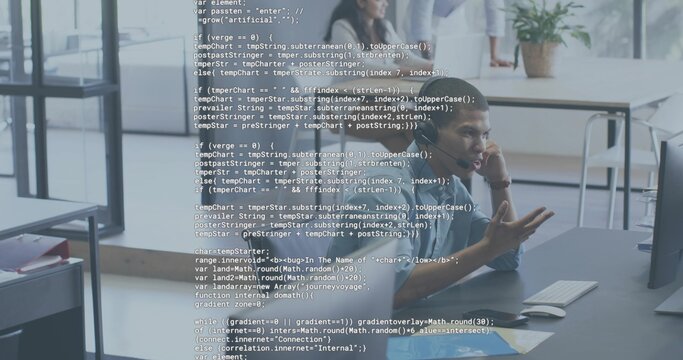 Gesturing man in button-down shirt explaining code on monitor at open office, with code overlay