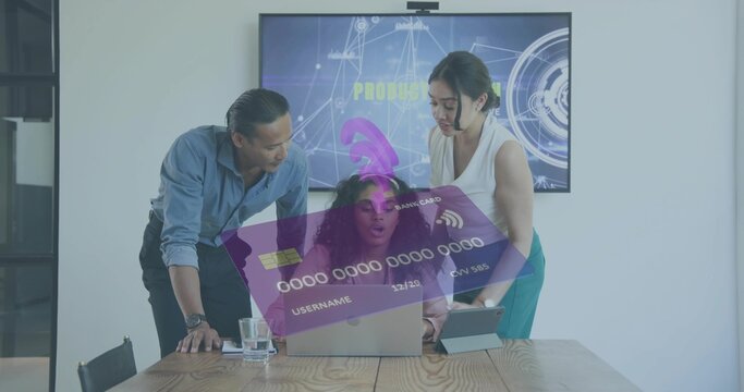 Reviewing three women in business shirts collaborating around wooden table, using laptop and tablet
