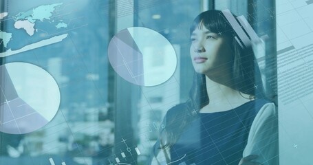 Gazing woman wearing business-casual dress at big glass window viewing digital overlays, copy space