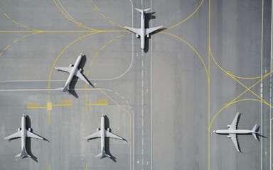 Aerial View of Parked Airplane on Airport Runway © 용석 주