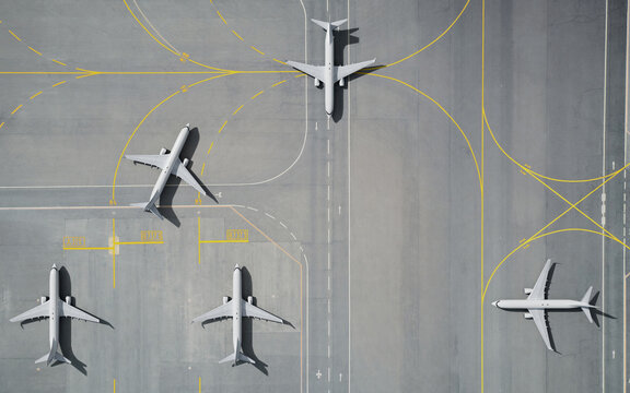 Aerial View of Parked Airplane on Airport Runway