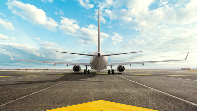 Parked Airplane on Airport Runway