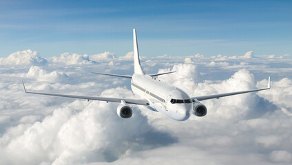 Obraz premium Jet Airplane Flying in the Blue Sky