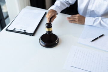 Lawyer businessman working with lawbook in office or courtroom Legal counsel with gavel and legal...