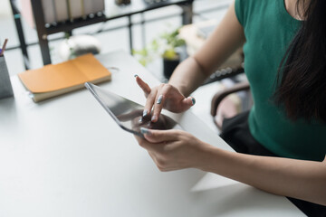 Asian woman Graphic designer working on digital tablet. artist drawing on graphic tablet female Artist Creative Designer sketch graphic drawing creative studying work