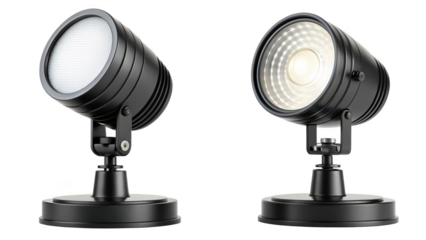 Two black outdoor led spotlight fixtures shown against white isolated on transparent background