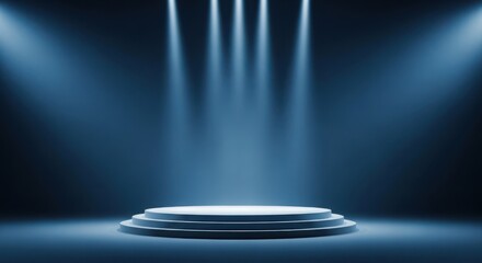 Blue spotlights illuminate an empty round stage podium in a dark studio, perfect for product display or event