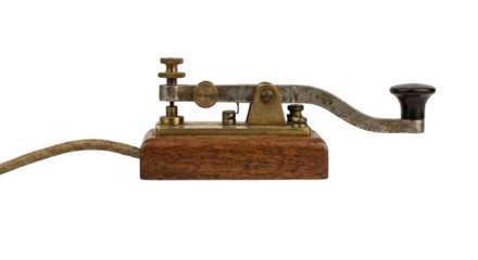 Vintage morse code telegraph key, an old historical communication device on isolated background.