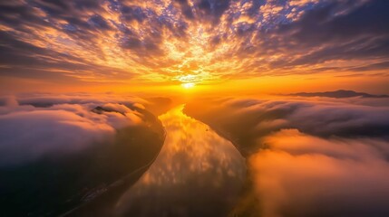 Stunning Sunset Over Serene River Surrounded by Soft Clouds and Vibrant Colors

