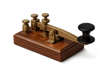 Antique brass telegraph key on a wooden base for morse code communication history.