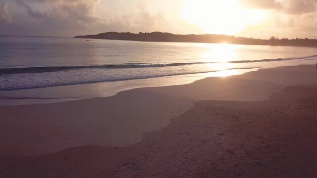 4k 30 fps sunrise in the caribbean beach in the mornig with drone 1