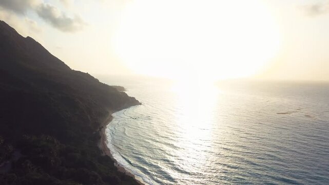 4k 30 fps sunset in th ecaribbean with mountains and the sea