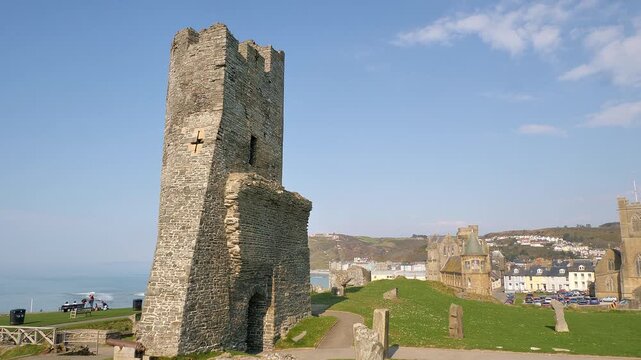 Aberystwyth, Ceredigion, Wales: Old College and town from the grounds of the castle on a beautiful sunny day with the sea waves in the background