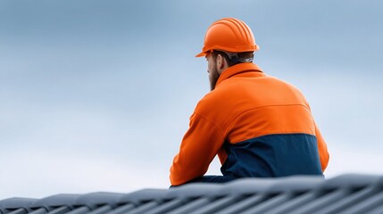 Professional construction worker wearing safety helmet and protective gear on industrial site emphasizing workplace safety and occupational protection standards