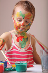 Child discovering the language of art through bold colors