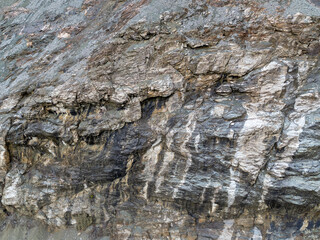 Rugged Cliff Face With Loose Gravel Slope in BC, Canada – Rocky Terrain and Eroded Bedrock