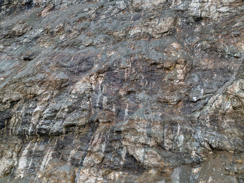 Rugged Rock Face Textures Across a Craggy Cliff Wall in BC, Canada