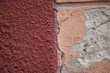 Textured wall showcasing peeling paint and cracks