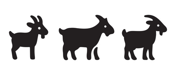 Black goat silhouettes with white eyes isolated on white.