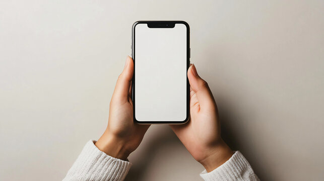 Woman's hands holding new smartphone mockup with blank screen for app promotion or social media advertising campaign, use it for your design - Powered by Adobe
