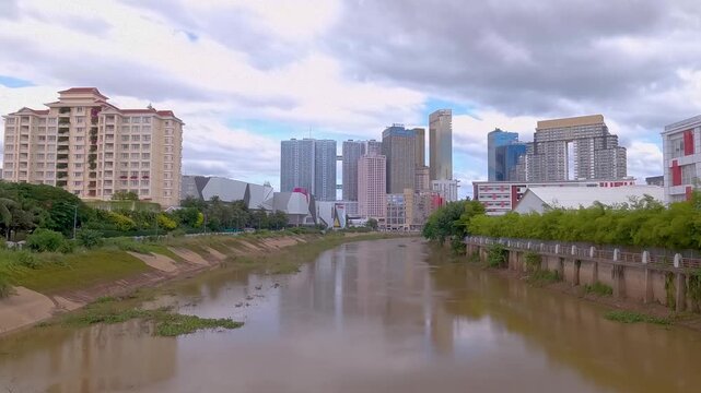 Skyline in Phnom Penh Cambodia timelapse view from Koh Pich island Tonle Bassac River