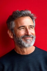 Obraz premium Red solid background. Classy men's textured crop haircut - midli