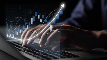 A close-up image capturing hands typing on a laptop with vibrant data charts and graphs symbolizing growth and analytics in a dark, professional environment. Copula