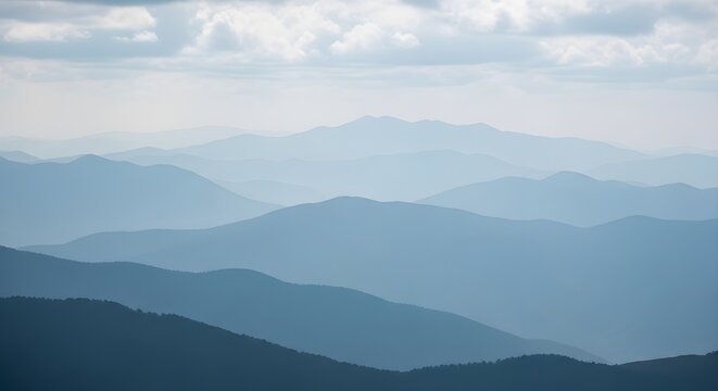 Blue ridge mountains atmospheric perspective, layers of peaks fade into the hazy distant sky - Powered by Adobe