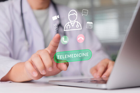 Doctor hand pressing virtual TELEMEDICINE button on holographic screen. Remote online consultation using digital technology. Healthcare medical services telehealth platform for appointment treatment.