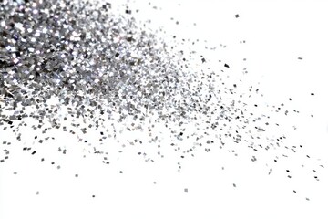 Obraz premium Sparkling Silver Splendor: A captivating close-up of scattered silver glitter, capturing its mesmerizing shimmer and reflecting the light in a dance of tiny, dazzling particles.