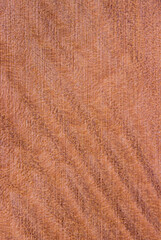 texture of wood. wooden board, eclological material. artificial wooden coating, 
from recycled materials,beautiful texture, light, brown, view from above. vertical texture.