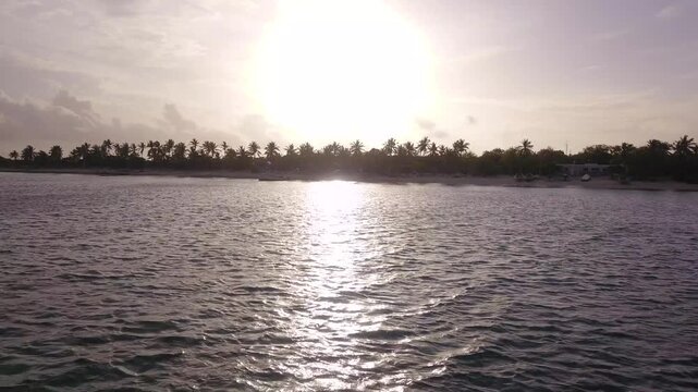 sunset/sinrise in the caribbean island with boats dominican republic
