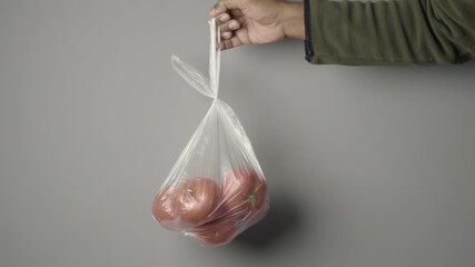 Fresh tomatoes in a plastic bag ready for cooking