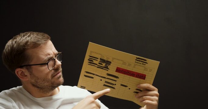 A careless employee holds a document marked &ldquo;sensitive data,&rdquo; joking about selling or sharing it, symbolizing poor data protection awareness and ethical issues in the workplace.