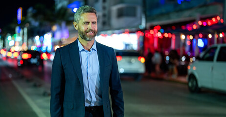 Businessman in suit. Hispanic businessman outdoor. Business success. Successful business man. Big city success. Boss business man finish late. Successful businessman at night city street, copy space