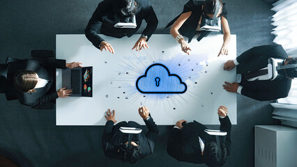 A dynamic business team collaborates in a modern office setting, using virtual reality headsets to explore cloud security and data protection strategies effectively. Trope