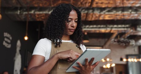 Thinking, woman and waitress in coffee shop with tablet for online menu planning or stock list. Digital technology, idea and female barista with inventory on app in morning at cafeteria or restaurant - Powered by Adobe