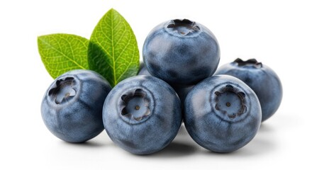 Fresh ripe organic blueberries with green leaves on white background.