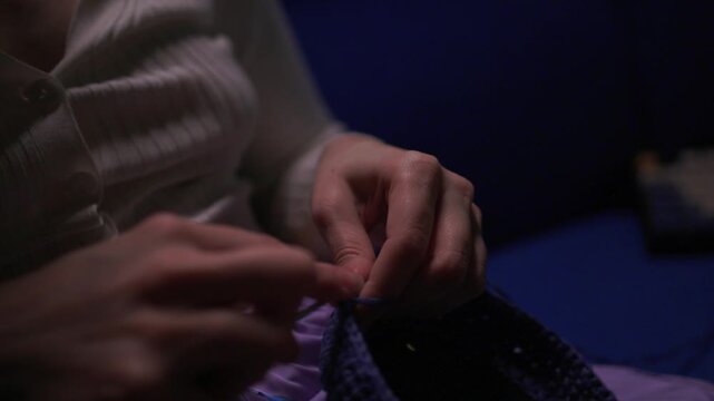 Crochet workshop scene, Artisan at work with yarn, Cozy crafting space with textured handmade stitches, Quiet studio environment dedicated to knitting and crochet crafts today